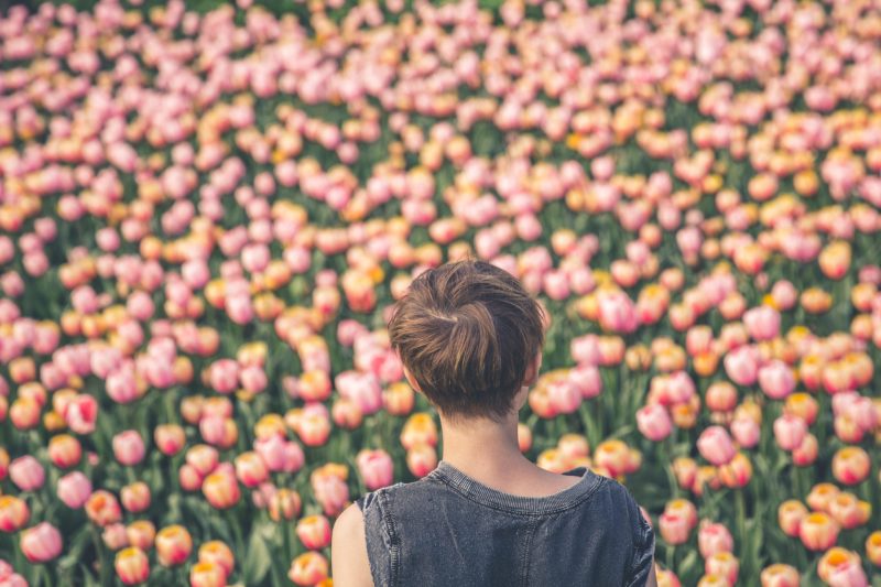 woman-viewing-tulips_4460x4460